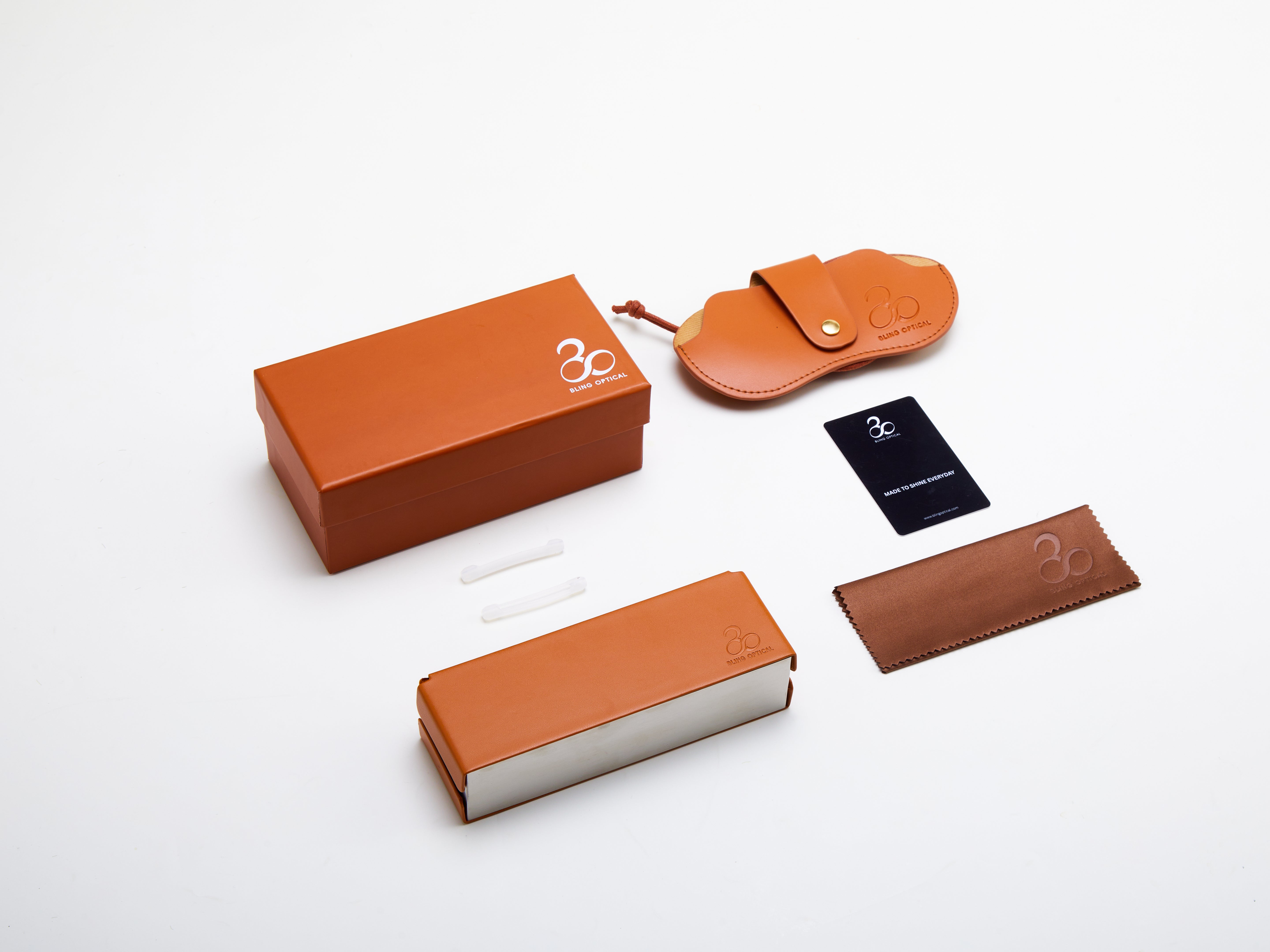 Bling Optical glasses packaging set with vegan leather case, soft case with lanyard, gift box, cleaning cloth, arm pads and authenticity card.